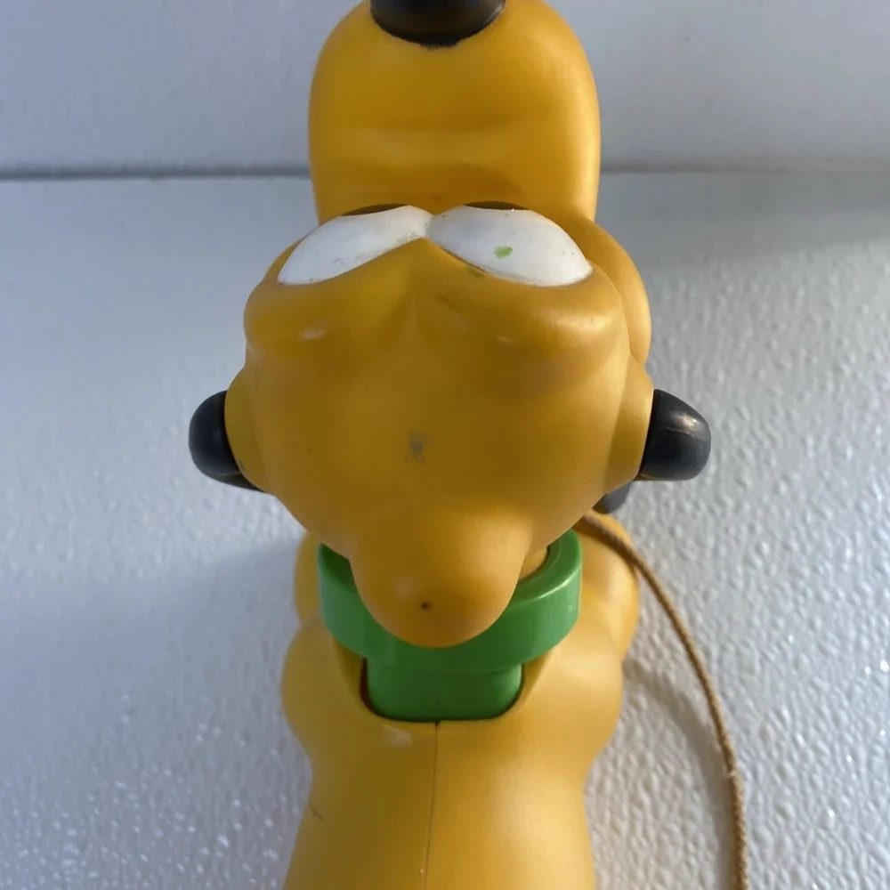 Vintage Disney Pluto Pull Toy Yellow Plastic Rolling Dog Mickey Mouse Friends